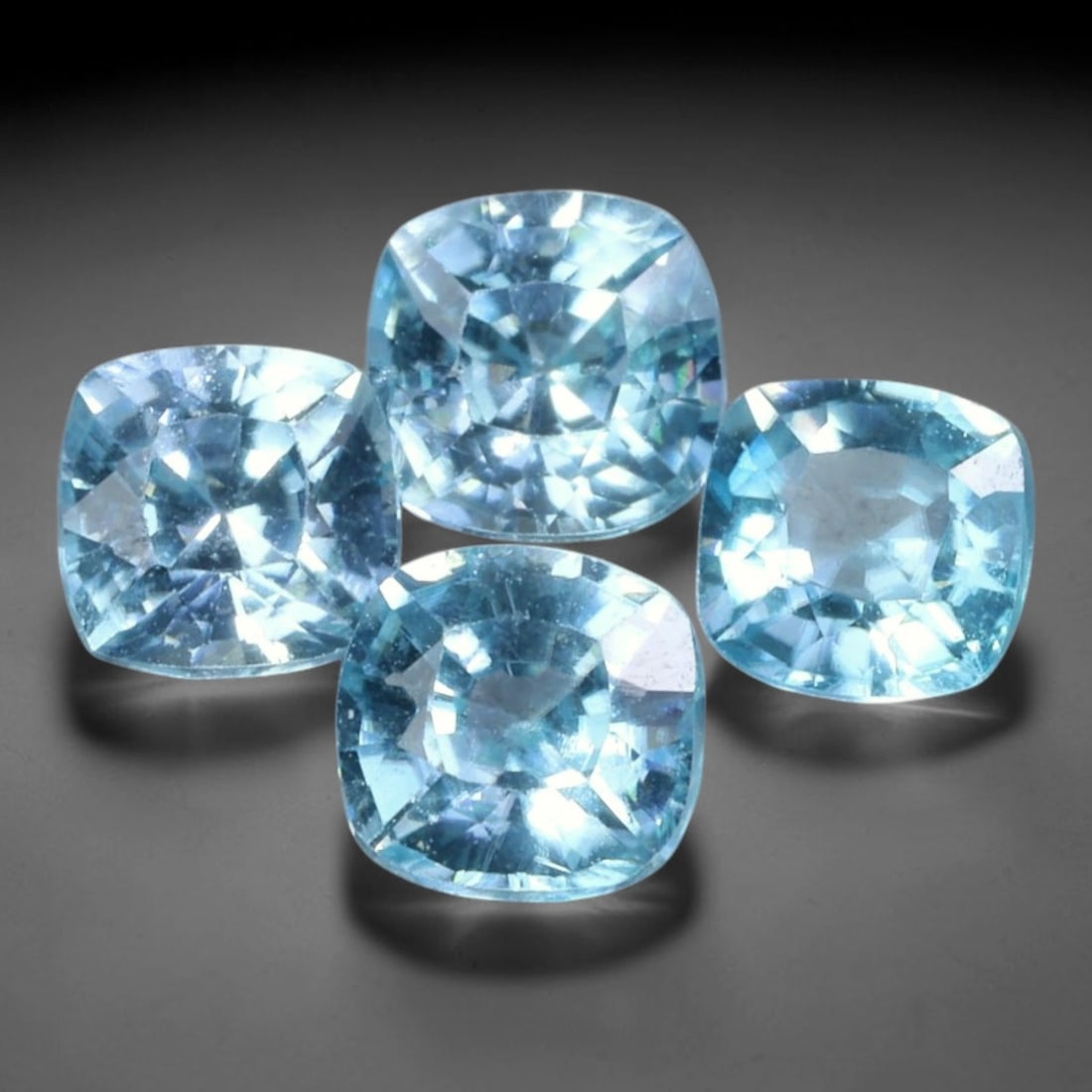 3.41ct Natural Blue Zircon Cushion Faceted Parcel Loose Gemstone, 22WW: Matching parcel of hand faceted natural blue zircon gemstones showcasing bright tranquil blue body hue with subtle inherent mineral traits within each stone. Precision faceting and sleek high polish m