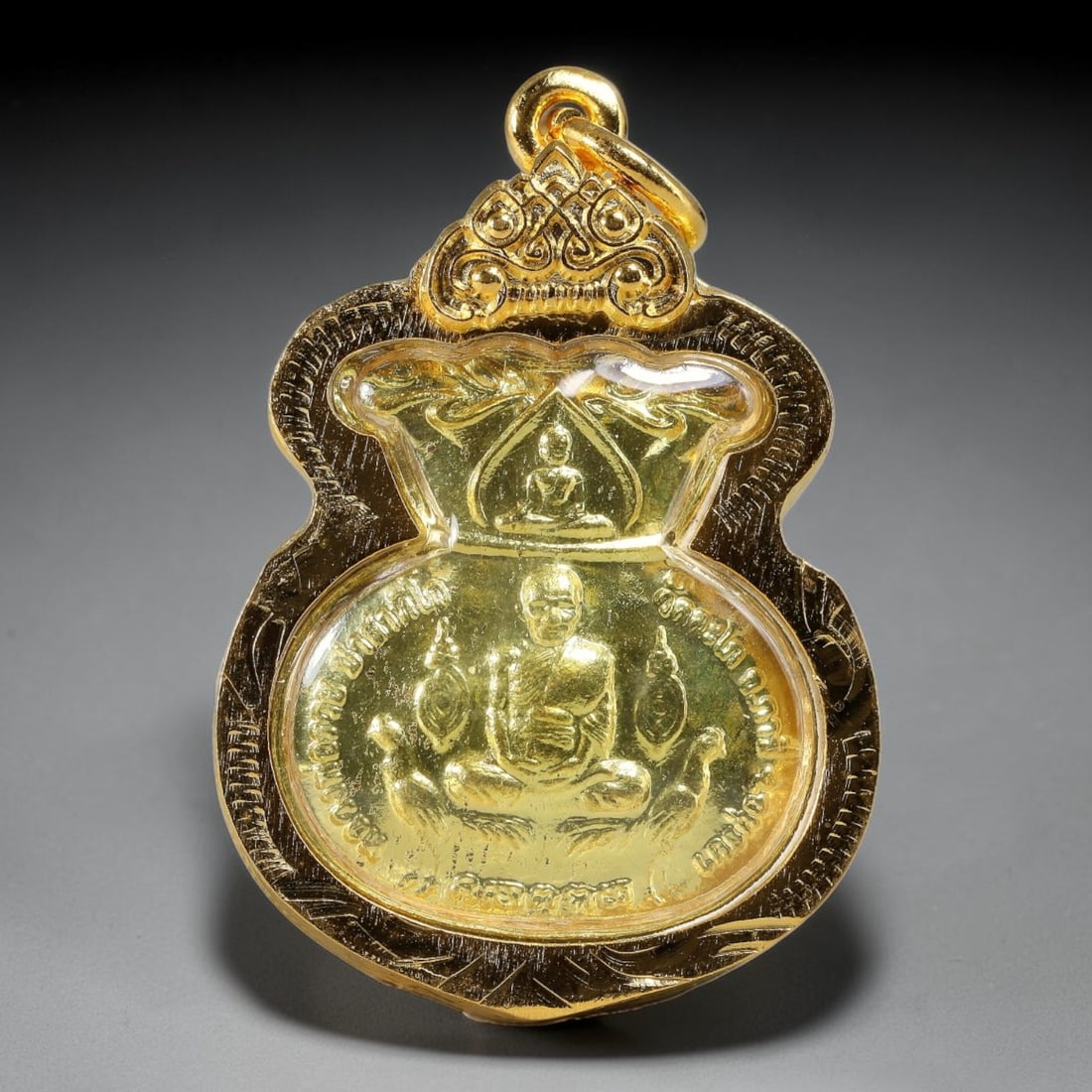 Thai Money Bag Shaped Luang Phor Monk Dual-Sided Gold Plated Metal Casing Amulet, 48YY: Classic wealth pouch money bag shaped Thai monk amulet sealed under transparent cover with fully carved golden casing and ornate decorative bail loop. The front features central embossed Luang Phor ma