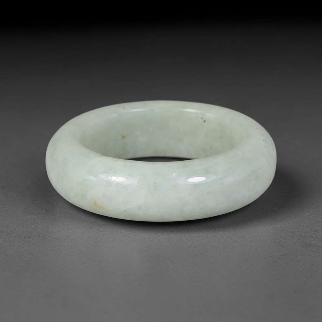 Natural Burmese Type A Jadeite Jade Band Ring Size US 11.5, 47TB: Crafted from untreated natural Burmese Type A jadeite jade, this solid stone band features a high-gloss polished finish displaying consistent deep green mineral tones interwoven with natural subtle to
