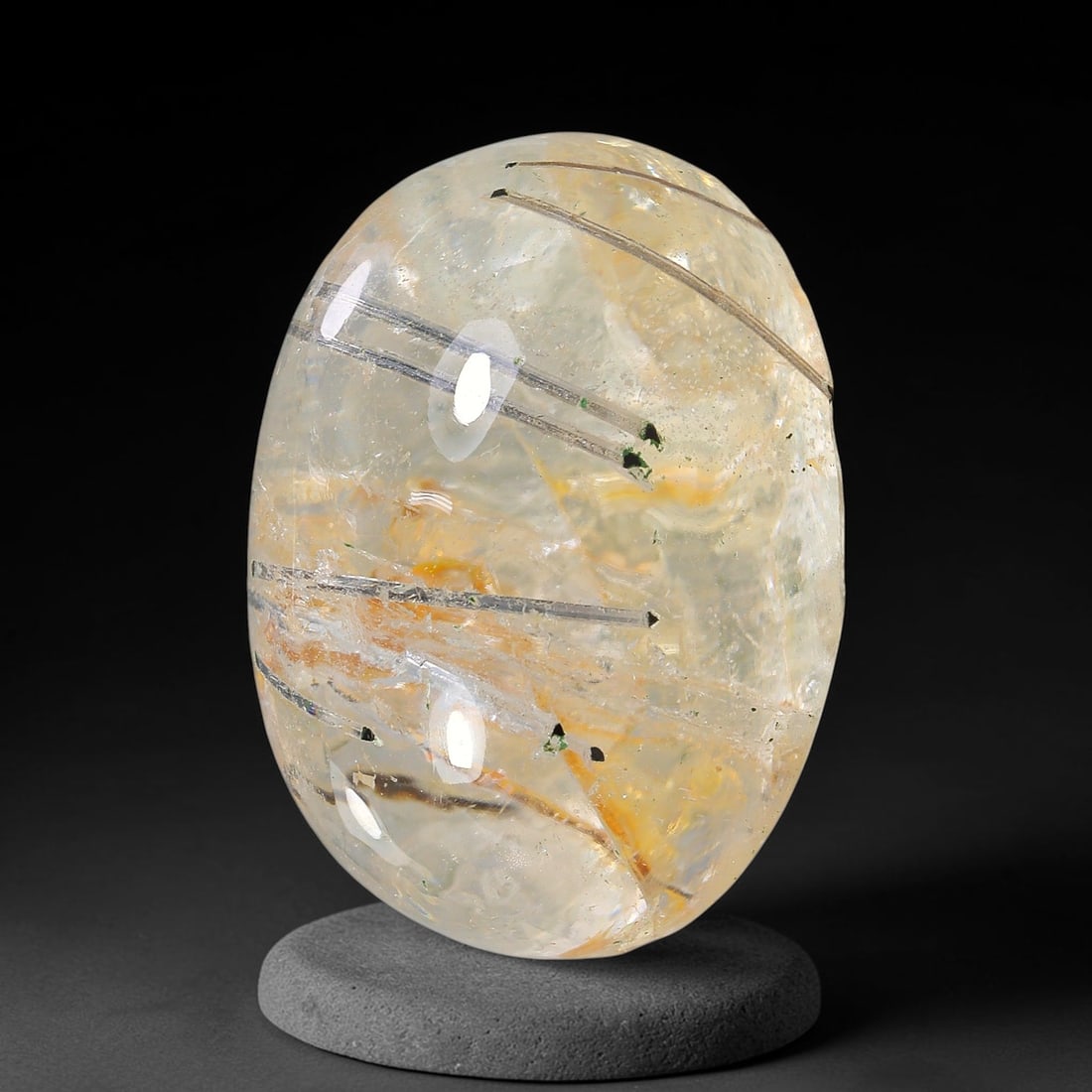 25.20ct Natural Brazilian Black Rutile Quartz Cabochon Loose Gemstone, 9YX: This polished cabochon of natural rutile quartz features countless distinct slender black rutile needle inclusions suspended within the clear quartz host crystal. The smooth domed surface enables full