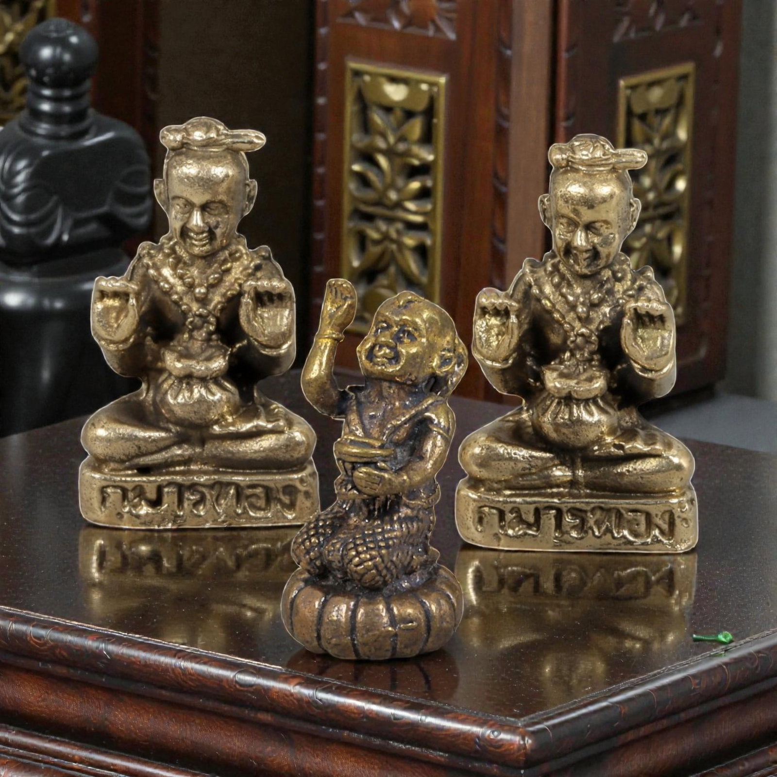 Thai Vintage Copper Alloy Kuman Thong Devotional Figures - 3pcs Set, 96ZB: This set of three devotional figures is crafted from copper alloy, exhibiting a warm golden patina and subtle surface wear consistent with vintage Thai folk religious objects. The pieces depict styliz