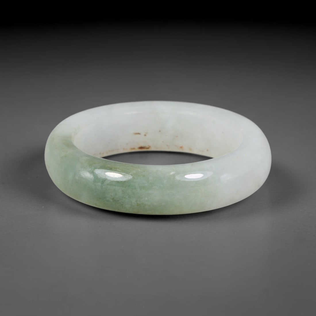 Natural Burmese Type A Jadeite Jade Band Ring Size US 10, 42TB: Crafted from untreated natural Burmese Type A jadeite jade, this solid stone band features a high-gloss polished finish displaying consistent deep green mineral tones interwoven with natural subtle to