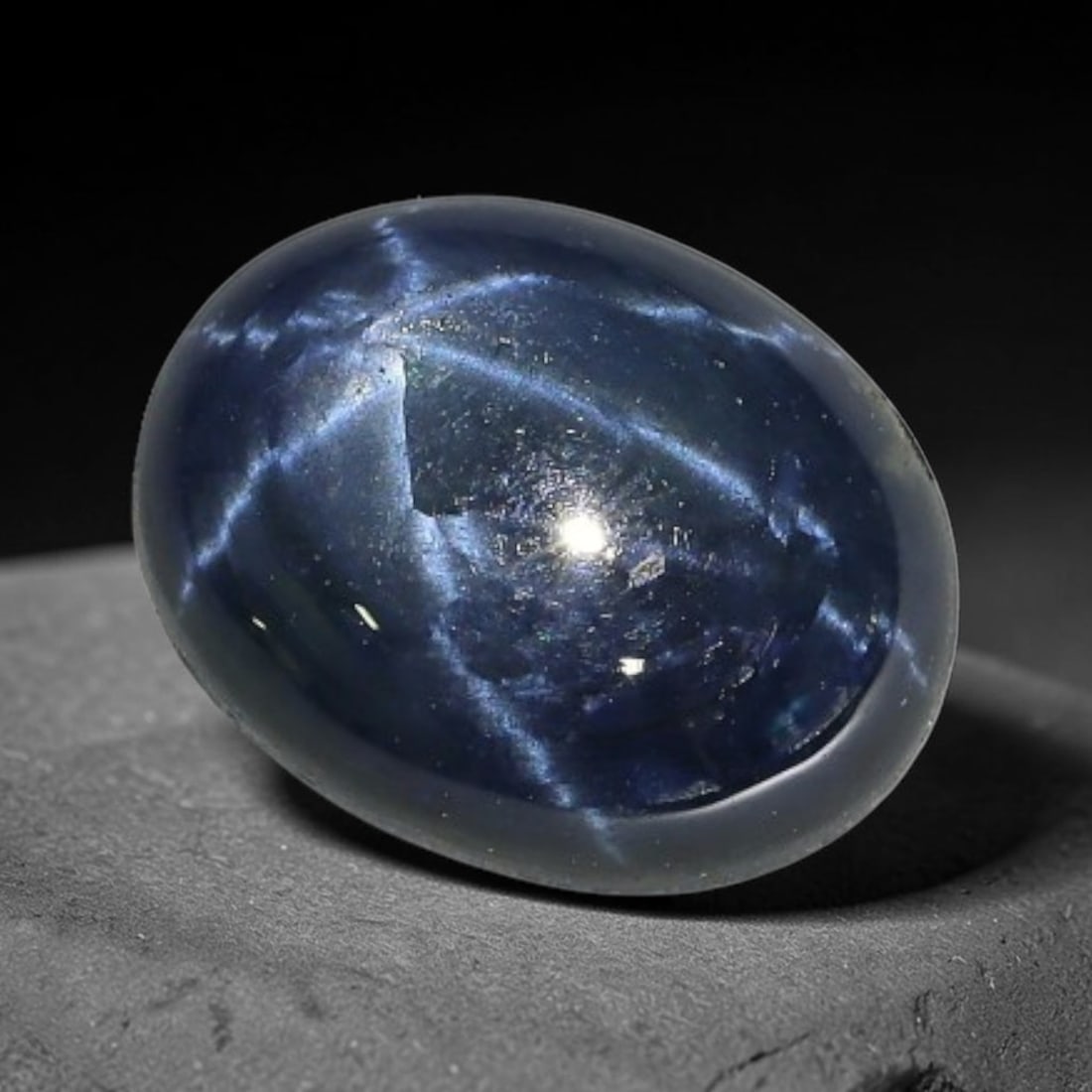 3.16 Carats Natural 6 Ray Blue Star Sapphire Loose Gemstone, 41XX: This star sapphire is crafted from natural corundum deposits and refined into a sleek polished cabochon form through professional lapidary finishing procedures. The distinct six-ray star asterism disp
