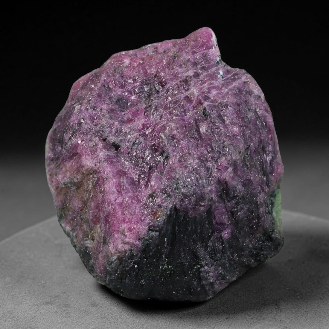 145ct Natural Tanzanian Ruby Zoisite Raw Rough Specimen Mineral Stone, 93YK: This unpolished mineral rough is natural ruby zoisite sourced from Tanzania, exhibiting distinct banded mineral segregation of vibrant green zoisite, magenta ruby crystals, and dark hornblende inclusi