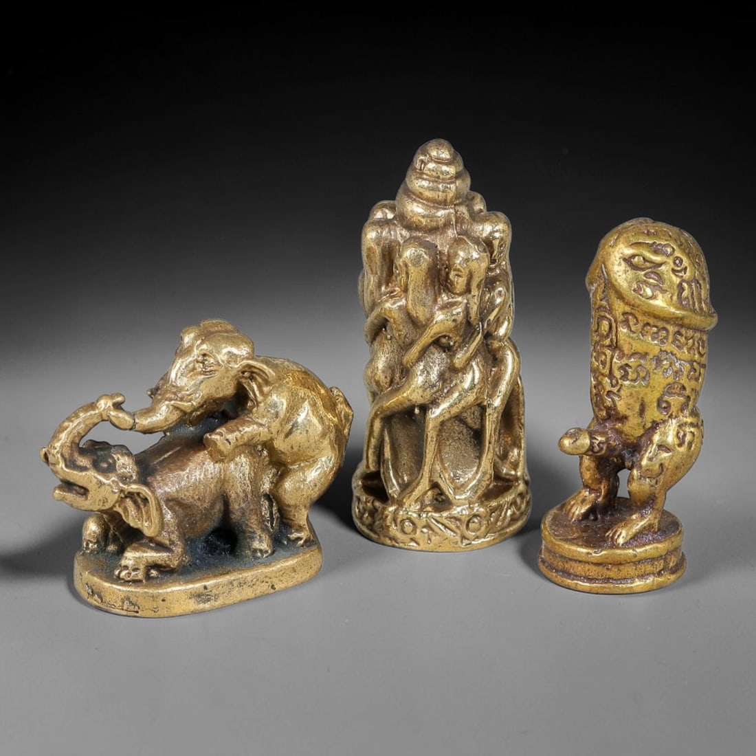 Thai Vintage Copper Alloy Sacred Fertility Devotional Figures - 3pcs Set, 87YY: Mini vintage copper alloy ritual figurine set of three pieces, each measuring 3.0x1.5cm. The set features paired elephant carving, multi-figure intertwined deity totem, and symbolic phallic animal sta