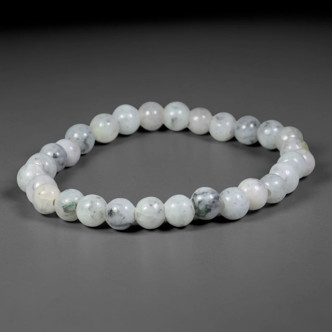 Natural Burmese Type A White Base Ink Splash Jadeite Jade Beaded Bracelet, 67TA: Handcrafted from 100% untreated authentic Burmese Type A jadeite, this bracelet features finely polished small round beads with a milky white base naturally scattered with smoky grey ink splash mottli