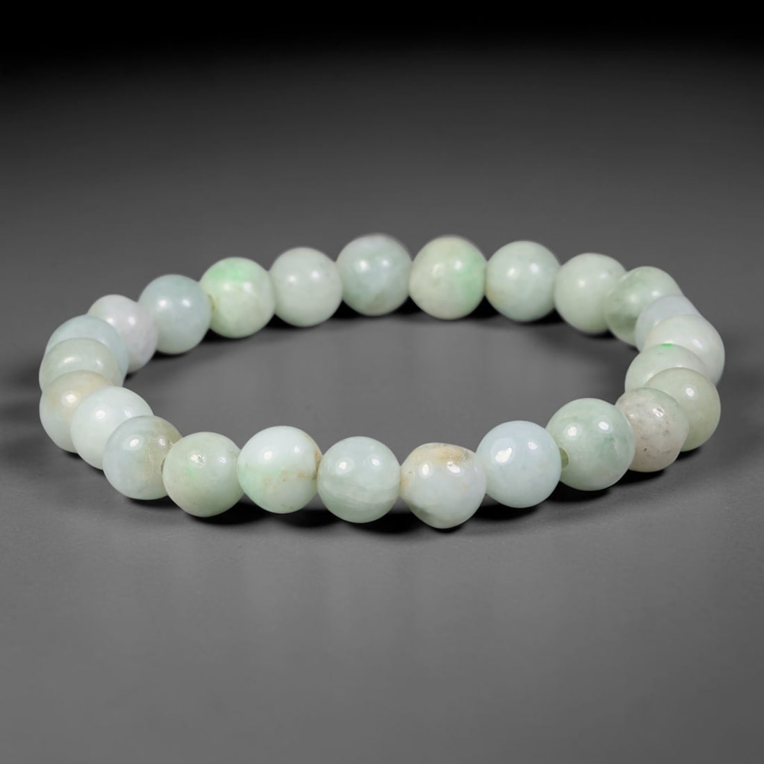 Natural Burmese Type A Pale White Floating Green Jadeite Jade Beaded Bracelet, 72TA: This bracelet is handcrafted from fully natural, untreated Burmese Type A jadeite, consisting of smoothly polished uniform round beads with a milky pale white base naturally dotted with soft floating 
