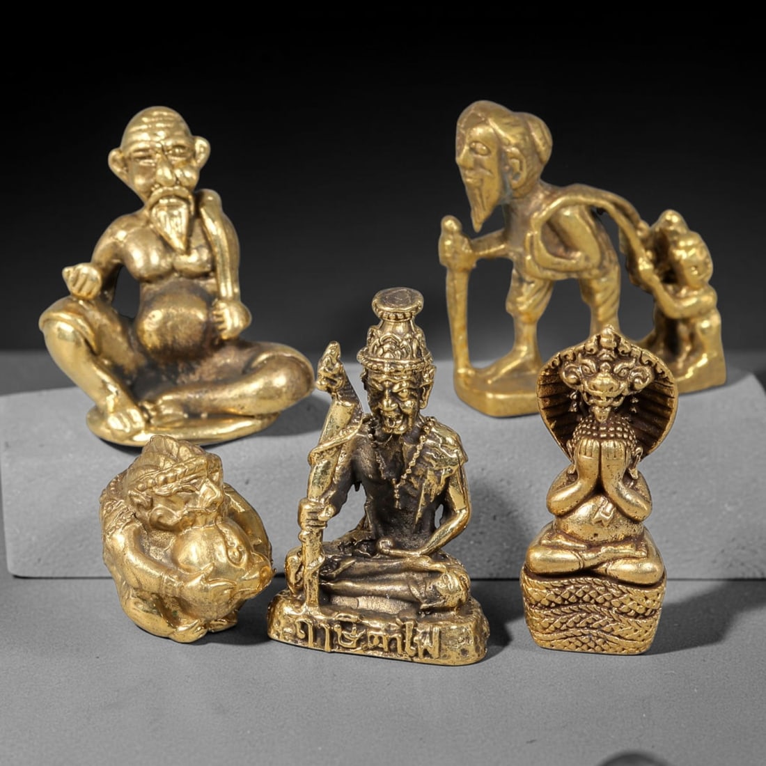Thai Vintage Copper Alloy Mixed Hermit & Naga Sacred Mini Figures - 5pcs Set, 14YZ: Vintage Thai copper alloy spiritual figurine set including 5 assorted mini statues, each sized 3.5x3.0cm. The collection features seated hermit monk statues, Naga sheltered praying Buddha, mythical be