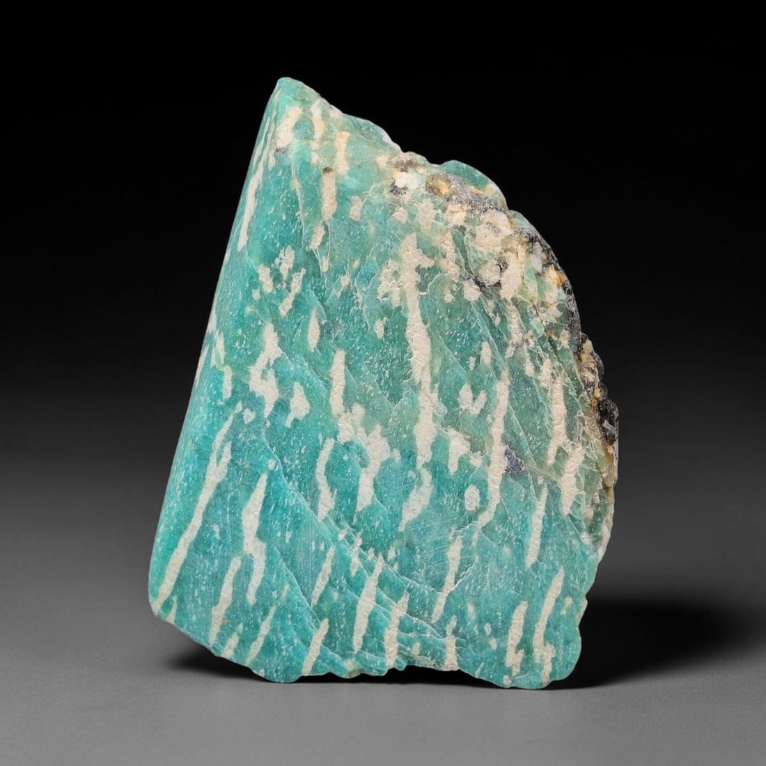 75ct Natural Russian Ural Amazonite Slab Rough, 35WV: This intact amazonite slab features distinct parallel mineral banding running uniformly across its naturally split flat surface within 41x30x9mm slab dimensions, retaining unmodified natural geologica