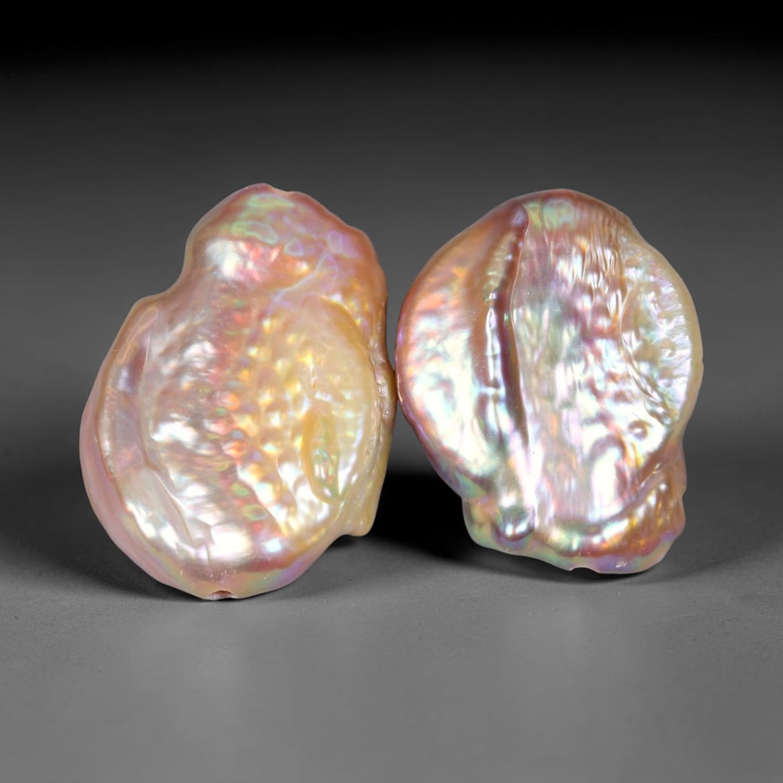 21.95ct Matched Pair Natural Freshwater Baroque Coin Pearls Loose Gemstones, 54XZ: Stunning matched pair of natural freshwater baroque coin pearls, each showcasing organic freeform flattened silhouettes with distinctive textured bumpy nacre surfaces that catch shifting light. The pe