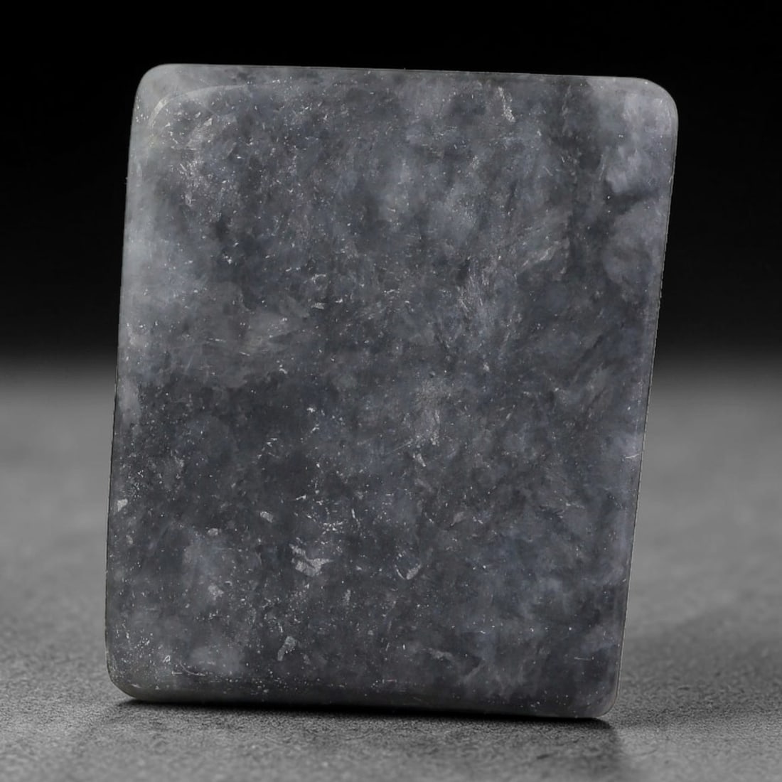 163ct Natural Type A Burmese Jadeite Jade Sliced Rough, 57YR: This specimen is a sliced rough block of natural Type A Burmese jadeite jade. The interior displays natural colour zoning with visible mineral veining and crystalline patterns typical of unprocessed j
