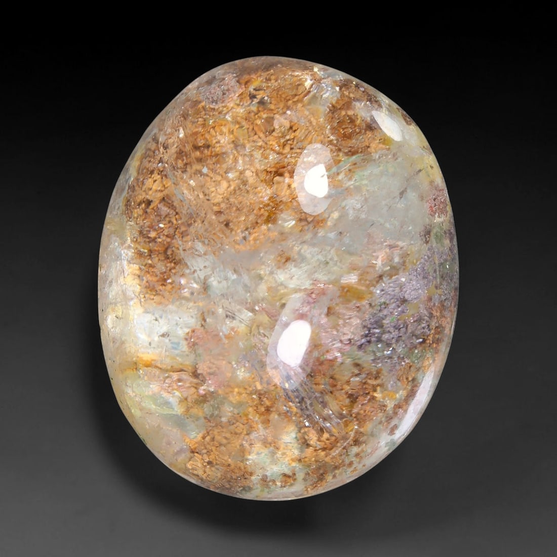 19.65ct Natural Brazilian Phantom Quartz Oval Cabochon Loose Gemstone, 66YX: This smoothly polished cabochon of natural phantom quartz preserves delicate layered phantom crystal formations enclosed inside transparent quartz host. The domed polished surface offers unobstructed 