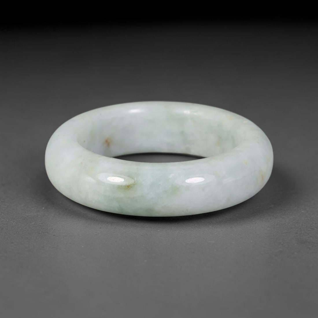 Natural Burmese Type A Jadeite Jade Band Ring Size US 11.5, 51TB: Crafted from untreated natural Burmese Type A jadeite jade, this solid stone band features a high-gloss polished finish displaying consistent deep green mineral tones interwoven with natural subtle to