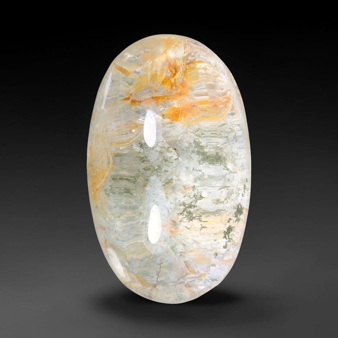 34.33ct Natural Brazilian Phantom Quartz Oval Cabochon Loose Gemstone, 62YV: This smoothly polished cabochon of natural phantom quartz preserves delicate layered phantom crystal formations enclosed inside transparent quartz host. The domed polished surface offers unobstructed 