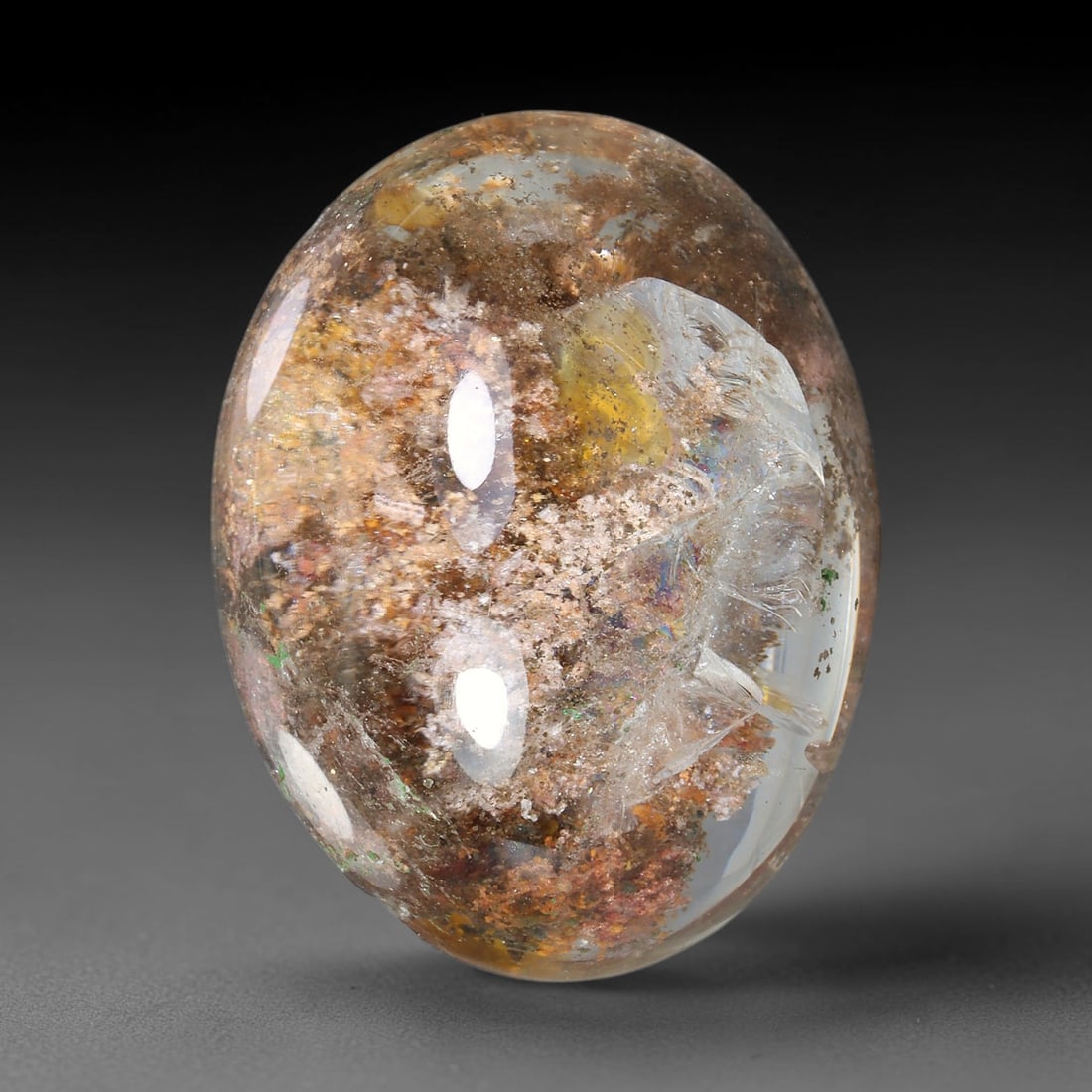 31.52ct Natural Brazilian Phantom Quartz Oval Cabochon Loose Gemstone, 95YV: This smoothly polished cabochon of natural phantom quartz preserves delicate layered phantom crystal formations enclosed inside transparent quartz host. The domed polished surface offers unobstructed 