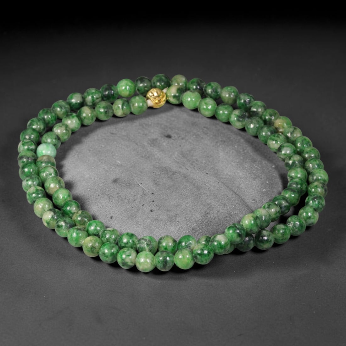 Natural Burmese Type A Deep Mottled Spinach Green Round Jadeite Jade Beaded Necklace, 39TF: Hand-strung bead necklace made of genuine untreated Type A Burmese jadeite round beads, displaying rich spinach green tones with natural deep green mottling and speckling throughout. Fitted with a pol
