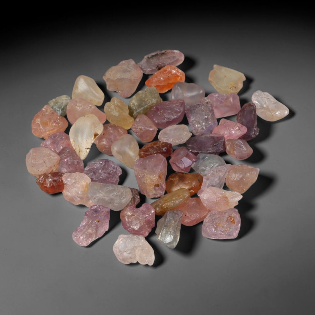 71.85ct Natural Multi-Colour Spinel Rough Parcel Loose Gemstone, 83YS: Natural spinel rough parcel showcasing a beautiful array of soft varied hues with subtle tonal differences throughout each crystal. Raw crystalline surfaces carry authentic natural mineral textures an
