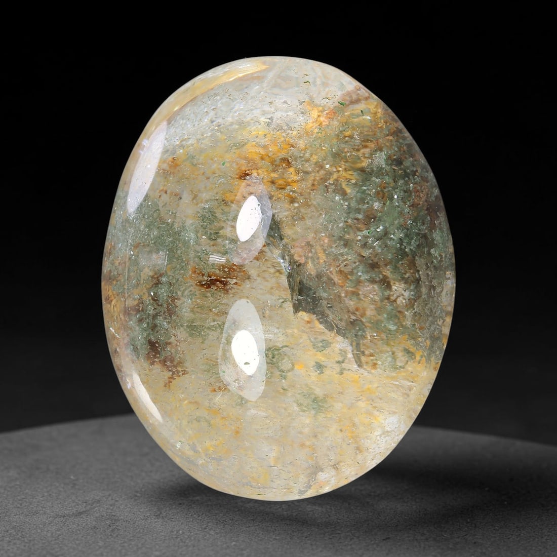 34.65ct Natural Brazilian Phantom Quartz Oval Cabochon Loose Gemstone, 89YV: This smoothly polished cabochon of natural phantom quartz preserves delicate layered phantom crystal formations enclosed inside transparent quartz host. The domed polished surface offers unobstructed 