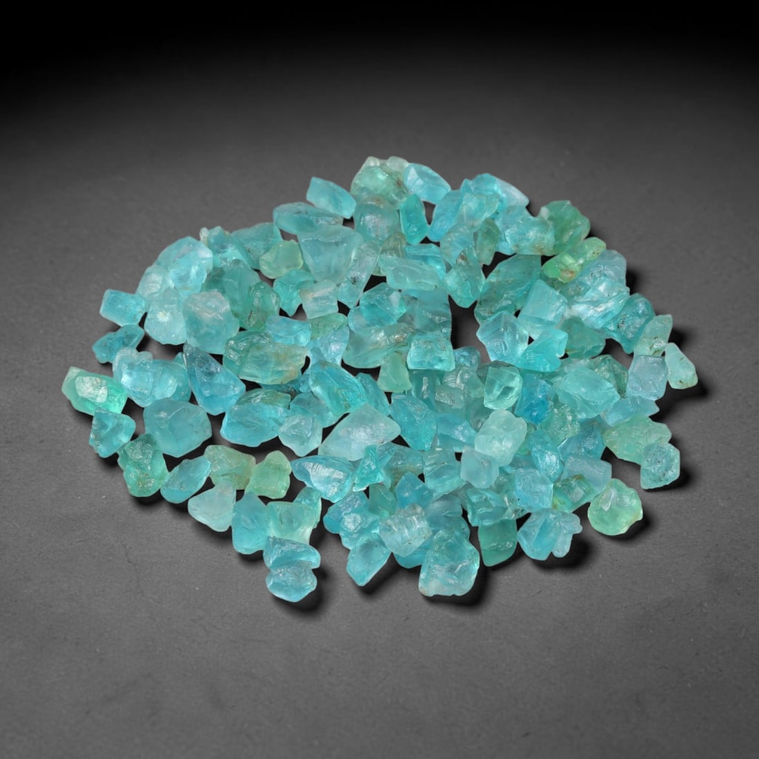 126.20ct Natural Blue Apatite Rough Parcel Loose Gemstone, 60YS: Natural apatite rough parcel featuring fresh bright blue colouration with subtle tonal variations across each crystal piece. Raw crystalline surfaces display authentic natural mineral textures and inh