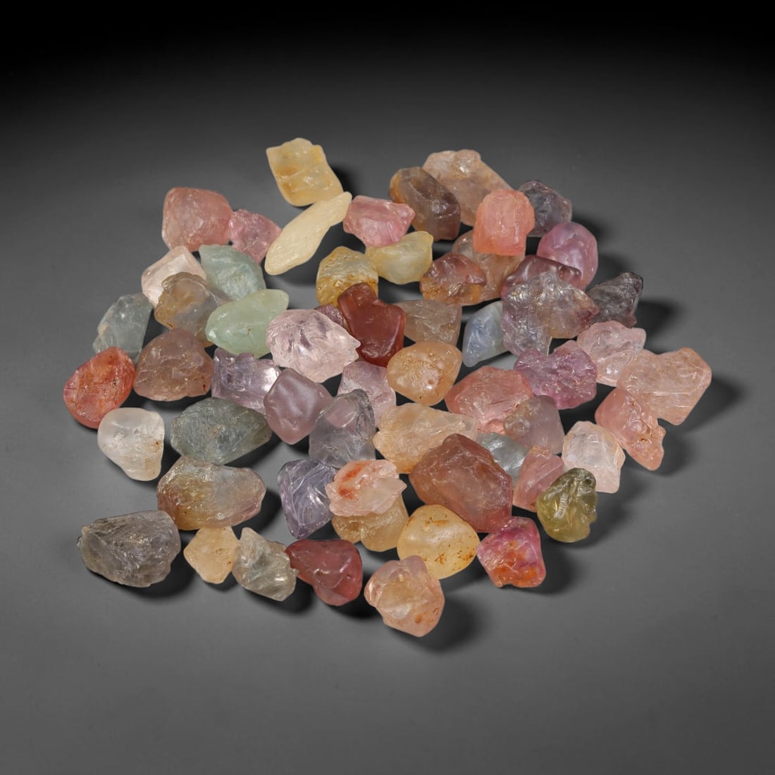 95.84ct Natural Multi-Colour Spinel Rough Parcel Loose Gemstone, 69YS: Natural spinel rough parcel showcasing a beautiful array of soft varied hues with subtle tonal differences throughout each crystal. Raw crystalline surfaces carry authentic natural mineral textures an
