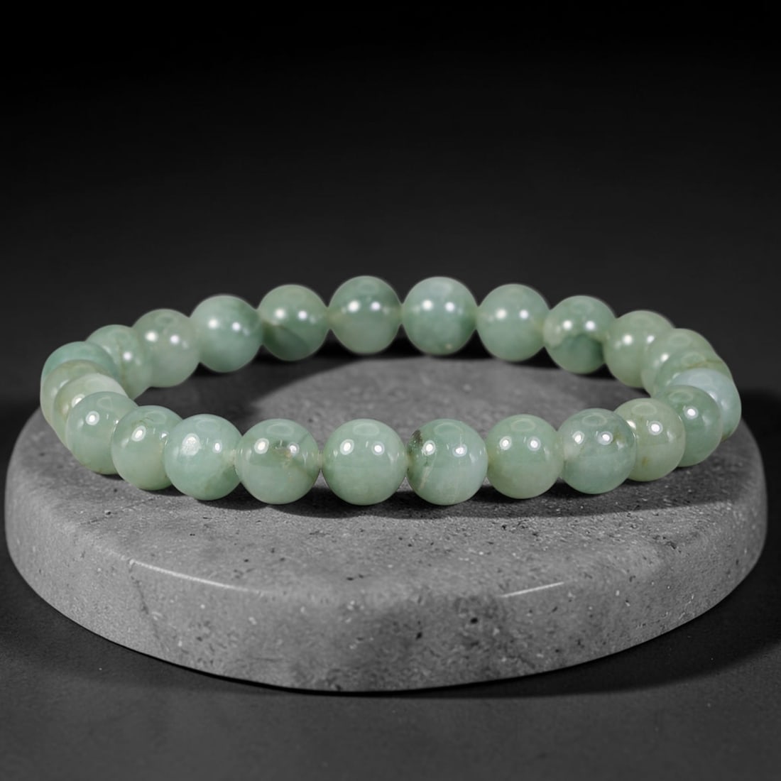 Natural Burmese Type A Soft Pale Sage Floating Vein Jadeite Jade Bead Bracelet, 28TP: Strung from natural Type A Burmese jadeite, this spherical bead bracelet features gentle pale sage green with faint natural floating mineral veins across the beads. Each bead is smoothly polished and 
