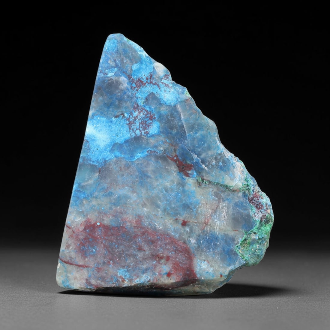 84.74ct Natural Peruvian Chrysocolla Polished Slab Rough, 84YS: This partial-polished chrysocolla slab features blended mineral matrix with smooth refined face and unaltered natural rugged edge across its 44x32x7mm elongated form, translucent mineral layers hold s
