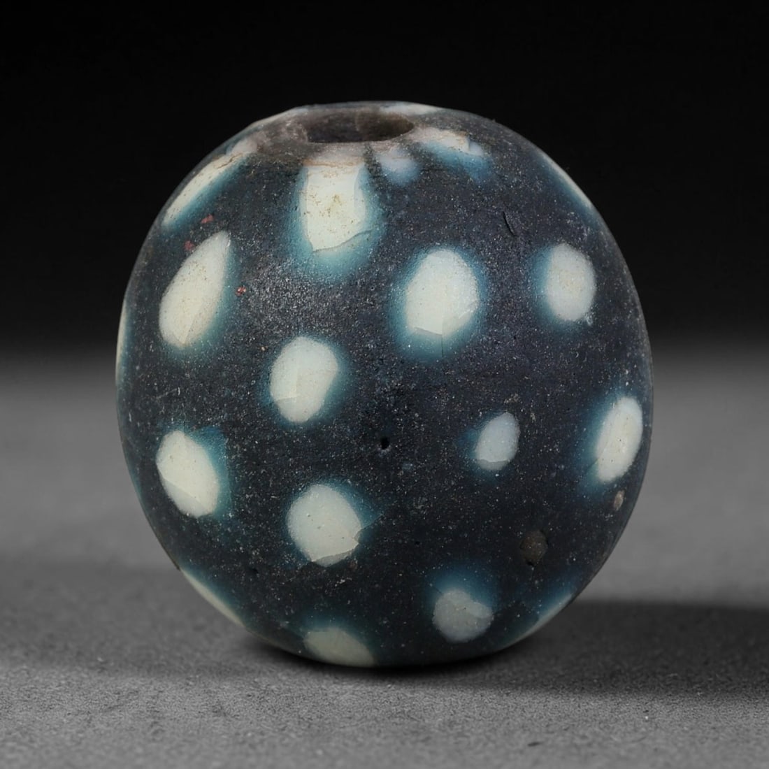 Antique Borneo Glass Trade Bead - 20mm Vintage Handcrafted Bead, 14XD: Antique Borneo glass beads hold deep cultural and historical significance within Southeast Asian maritime trade networks. For centuries, these glass spheres circulated as vital currency, ceremonial ta