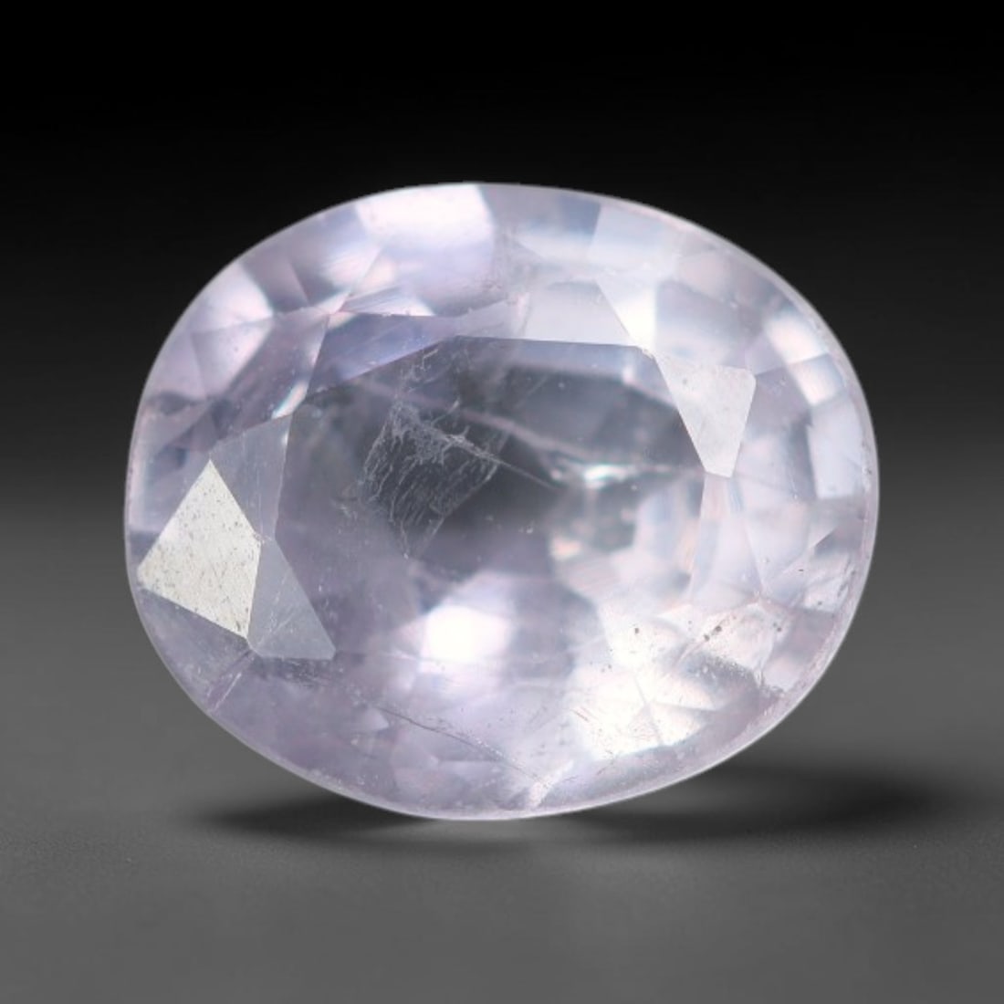 0.49 Carats Natural Pale Lavender Pink Sapphire Loose Faceted Gemstone, 9XM: Natural soft pale lavender-pink corundum sapphire expertly faceted loose gemstone, multi-brilliant cut maximizes light sparkle and showcases a delicate translucent pastel lilac-pink hue. Fine natural 