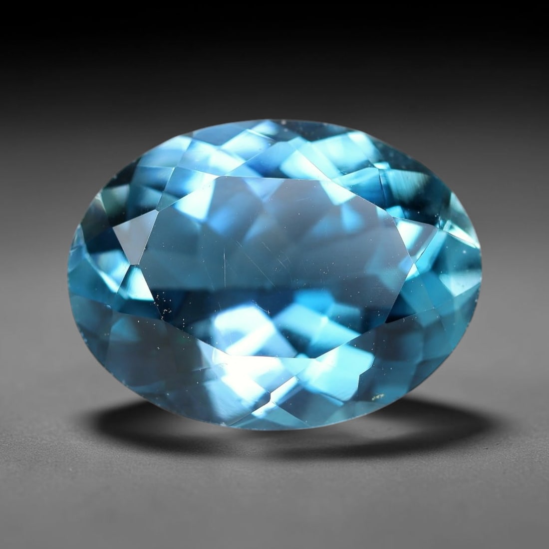 9.87 Carats Natural London Blue Topaz Oval Faceted Loose Gemstone, 38XY (1 of 1)
