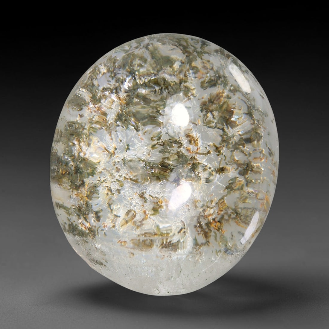 25.85ct Natural Brazilian Phantom Quartz Oval Cabochon Loose Gemstone, 26YZ: This smoothly polished cabochon of natural phantom quartz preserves delicate layered phantom crystal formations enclosed inside transparent quartz host. The domed polished surface offers unobstructed 