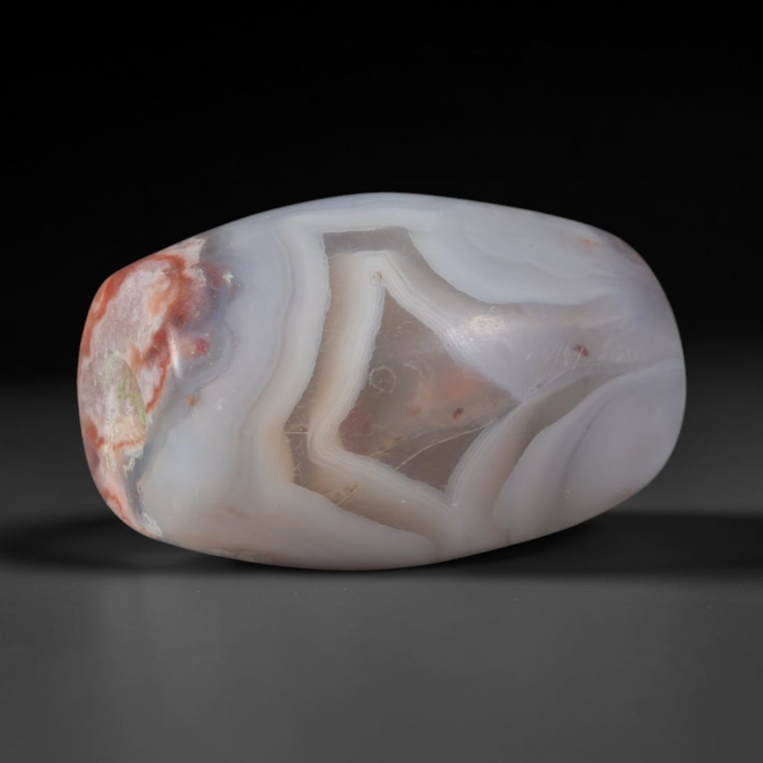 Ancient Sogdian Culture Banded Agate Barrel Bead (500 BCE-800 CE), 61XD: This antique banded agate barrel bead originates from Sogdian Culture, the transcontinental Silk Road merchant civilization that produced and circulated chalcedony adornments between East Asian, Persi