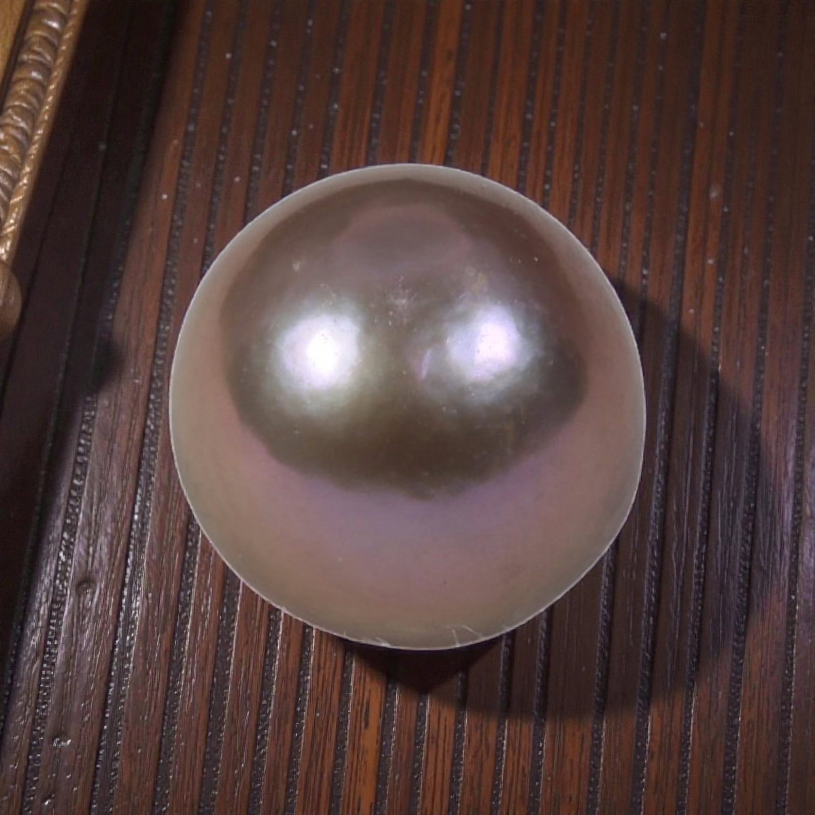 7.07ct Natural Freshwater Pearl - Pale Lavender Pink Sphere 9.8mm, 47YG: This specimen is natural freshwater pearl, fully polished into a symmetrical spherical cabochon with soft pale lavender-pink nacre luster and subtle warm taupe reflective undertones. Fine faint surfac