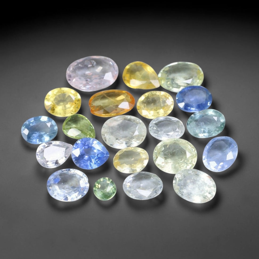 4.32ct Natural Fancy Color Sapphire Oval Mixed Cut Loose Gemstone, 2TH: Fancy color sapphire faceted into a compact oval mixed cut with polished table and pavilion facets. The stone displays a soft pastel green body color with good light return and subtle internal silk in