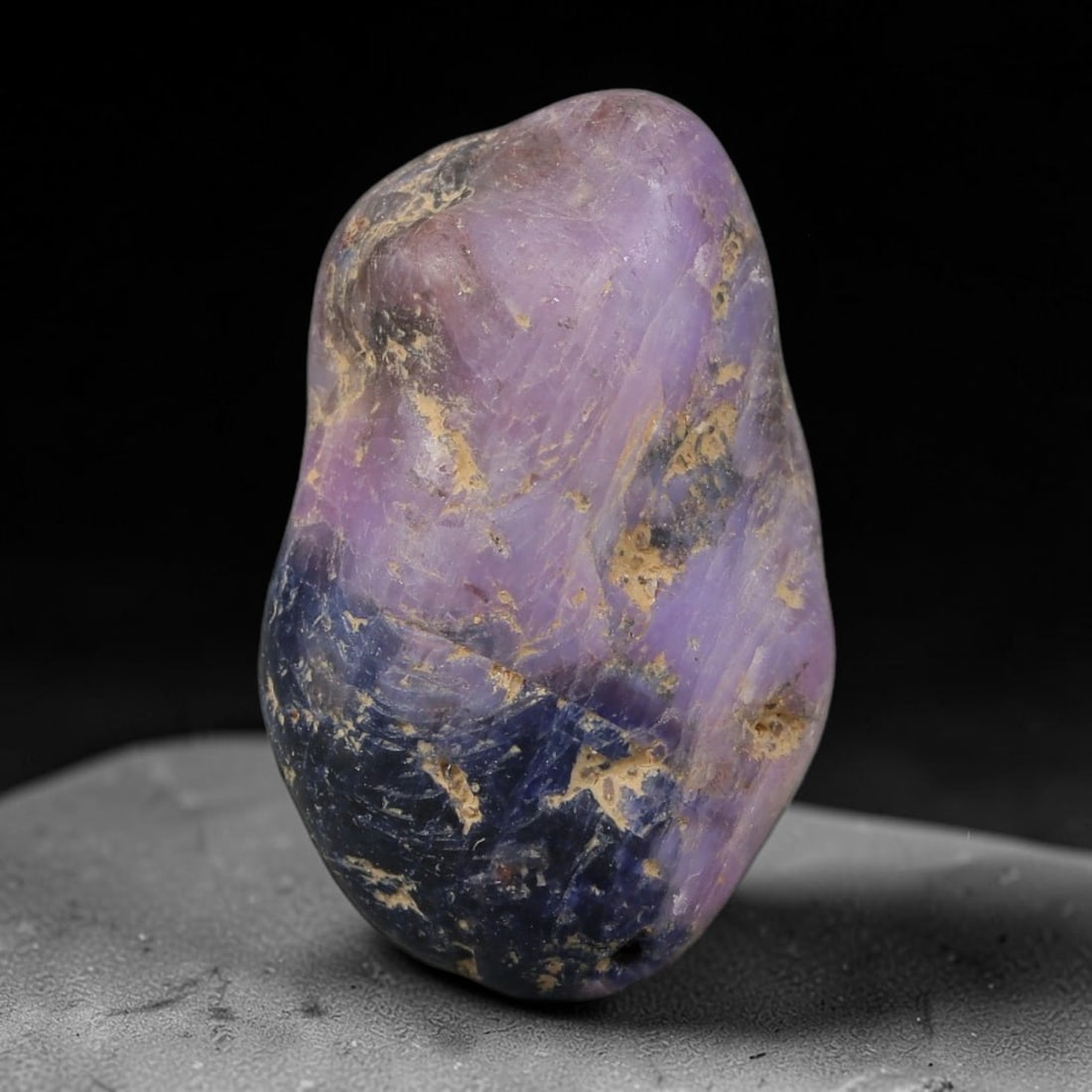 46ct Natural Unheated Sri Lankan Purplish Blue Sapphire Rough, 42YQ: This natural corundum rough is an unheated purplish blue sapphire sourced from Sri Lankan alluvial gem deposits, featuring an irregular natural native form with residual pale yellow-brown mineral matr