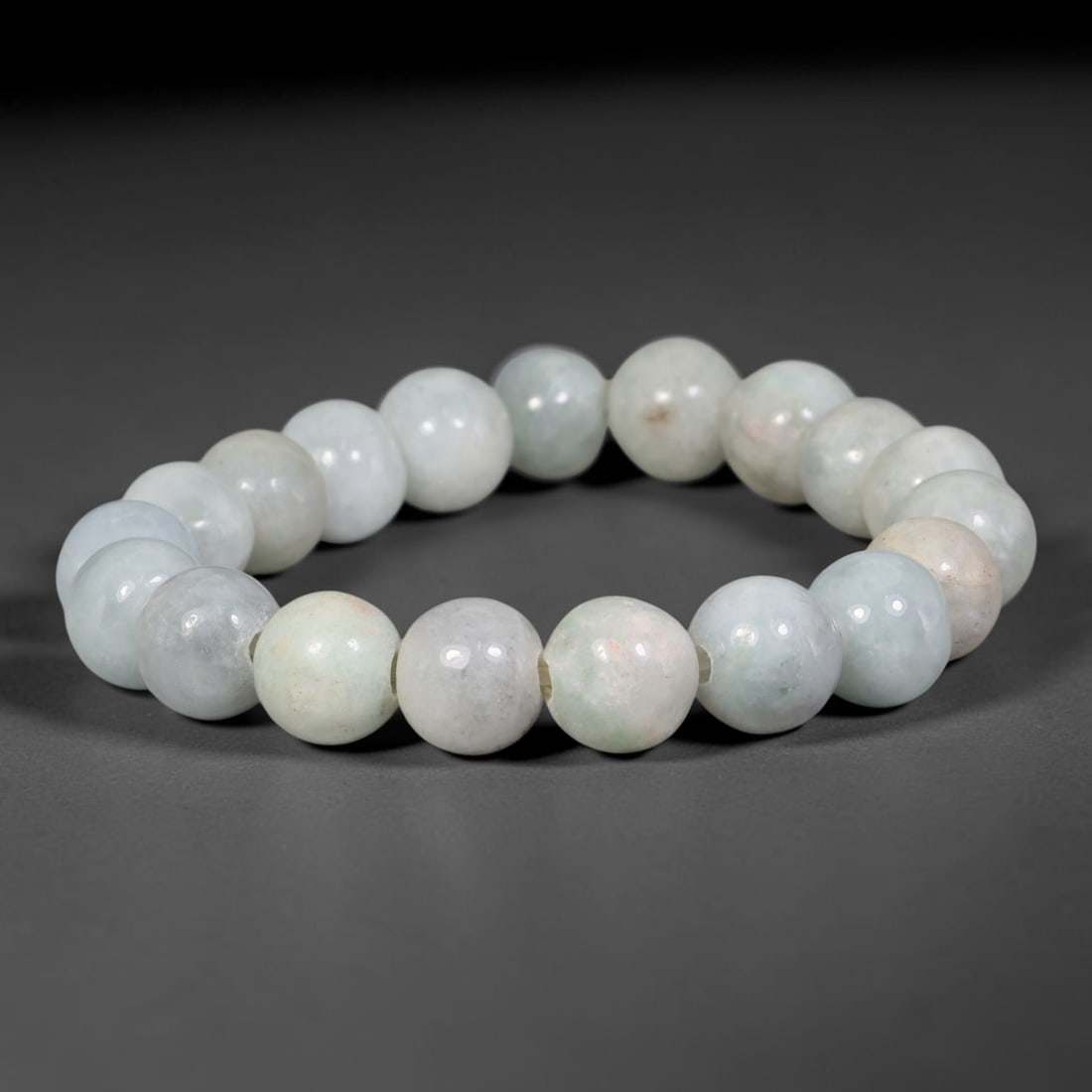 Natural Burmese Type A Pale Ice Light Celadon Jadeite Jade Beaded Bracelet, 93TA: Expertly crafted from 100% untreated authentic Burmese Type A jadeite, this bracelet features uniformly polished medium round beads with a soft translucent pale ice base blended with subtle light cela