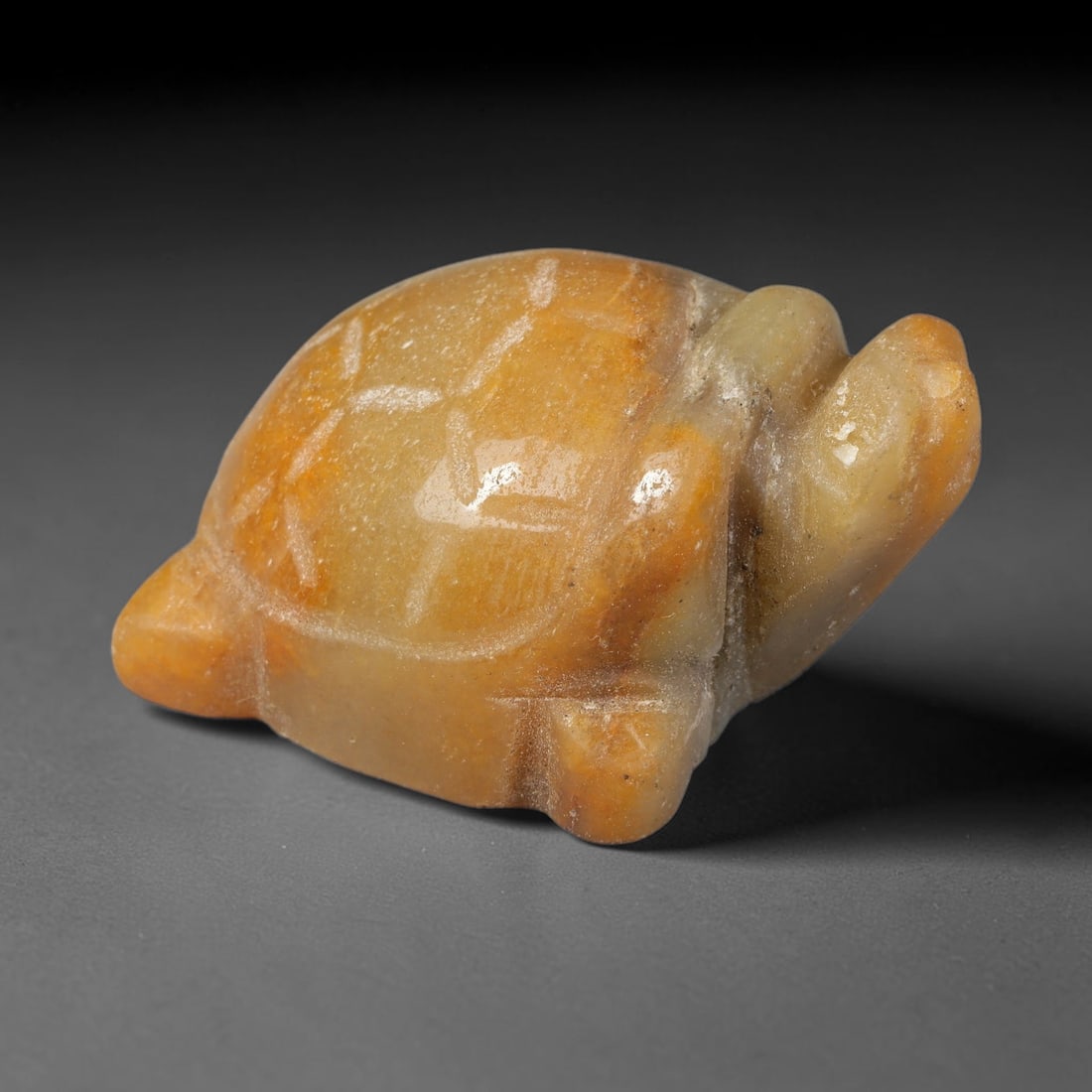 Natural Burmese Type A Yellowish Jadeite Jade Turtle Carving, 96TC: Hand-carved from natural Burmese Type A jadeite, this turtle figurine measures 46x33mm. It features warm yellow and honey-amber blended tones with natural veining and subtle mineral speckling across t
