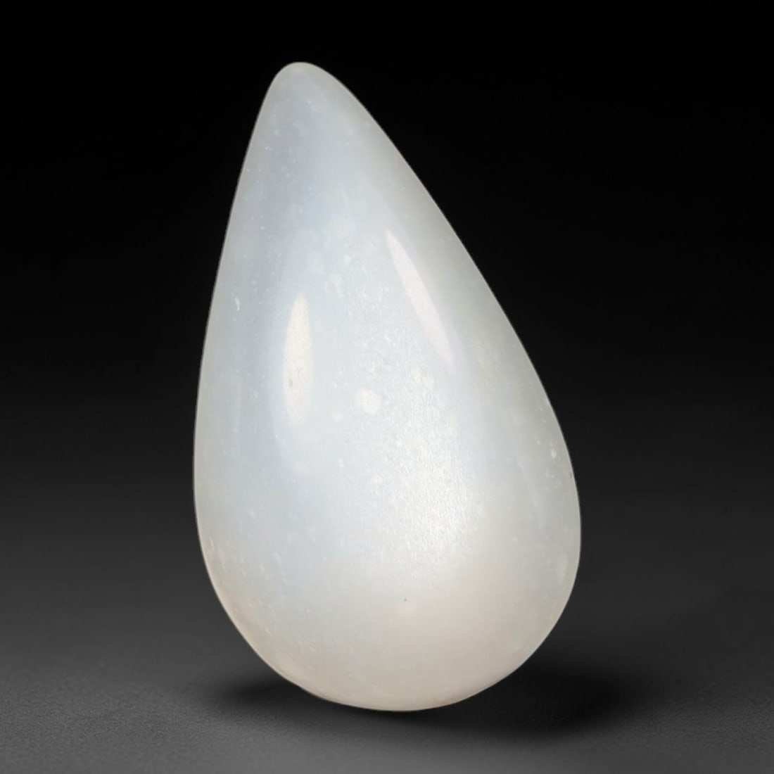 6.76 Carats Natural Ceylon Soft Milky White Moonstone Pear Teardrop Cabochon Loose Gemstone, 79WS: This soft milky white Ceylon moonstone pear teardrop cabochon features a translucent pale cream feldspar base scattered with faint subtle internal micro-speckles, with gentle diffused adularescent glo