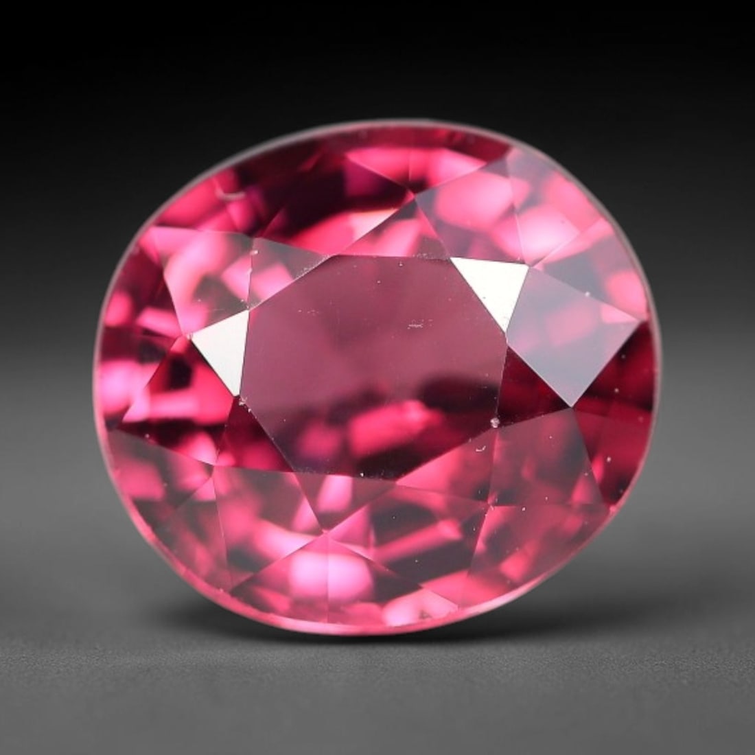 1.70 Carats Natural Deep Burgundy Red Garnet Oval Faceted Loose Gemstone, 66WY: This timeless oval faceted garnet boasts a luxuriously deep burgundy red tone that glows with vivid crimson fire across its precisely polished reflective facets. Fine natural micro mineral specks are 