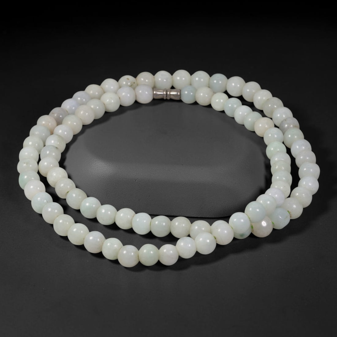 Natural Burmese Type A Pure White Jadeite Jade Beaded Necklace, 8TF: Strung from untreated natural Burmese Type A jadeite jade spherical beads measuring 8.3mm in diameter, this full strand boasts a smooth consistent polished finish with soft pure white base tones paire