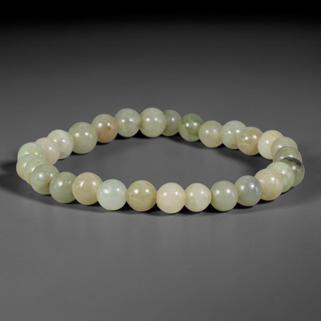 Natural Burmese Type A Pale Celadon & Honey Yellow Mixed Jadeite Jade Beaded Bracelet, 27TA: Crafted from untreated natural Burmese Type A jadeite jade beads with maximum bead dimension of 7.48mm, this wearable strand features smooth polished beads blending soft celadon green and warm honey y