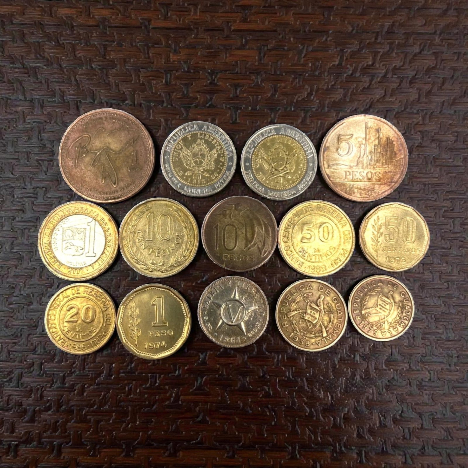 LATIN AMERICA: Sovereignty & Economic Evolution - 14-Piece Coins Set, 1960-2009, 19-29mm, 13ZJ: This curated 14-Piece Coins Set spans nearly half a century of Latin American numismatic history, featuring coins from Argentina, Venezuela, Guatemala, Panama, and other nations, ranging from 19 to 29