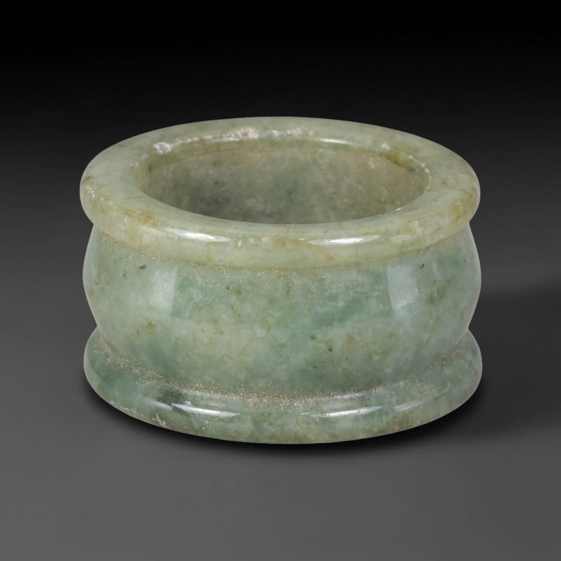 Natural Burmese Type A Jadeite Jade Band Ring Size US 9.50, 10TB: Fashioned from untreated natural Burmese Type A jadeite jade, this solid stone band carries a smooth polished finish showcasing milky pale base tones blended with soft natural green mineral undertones
