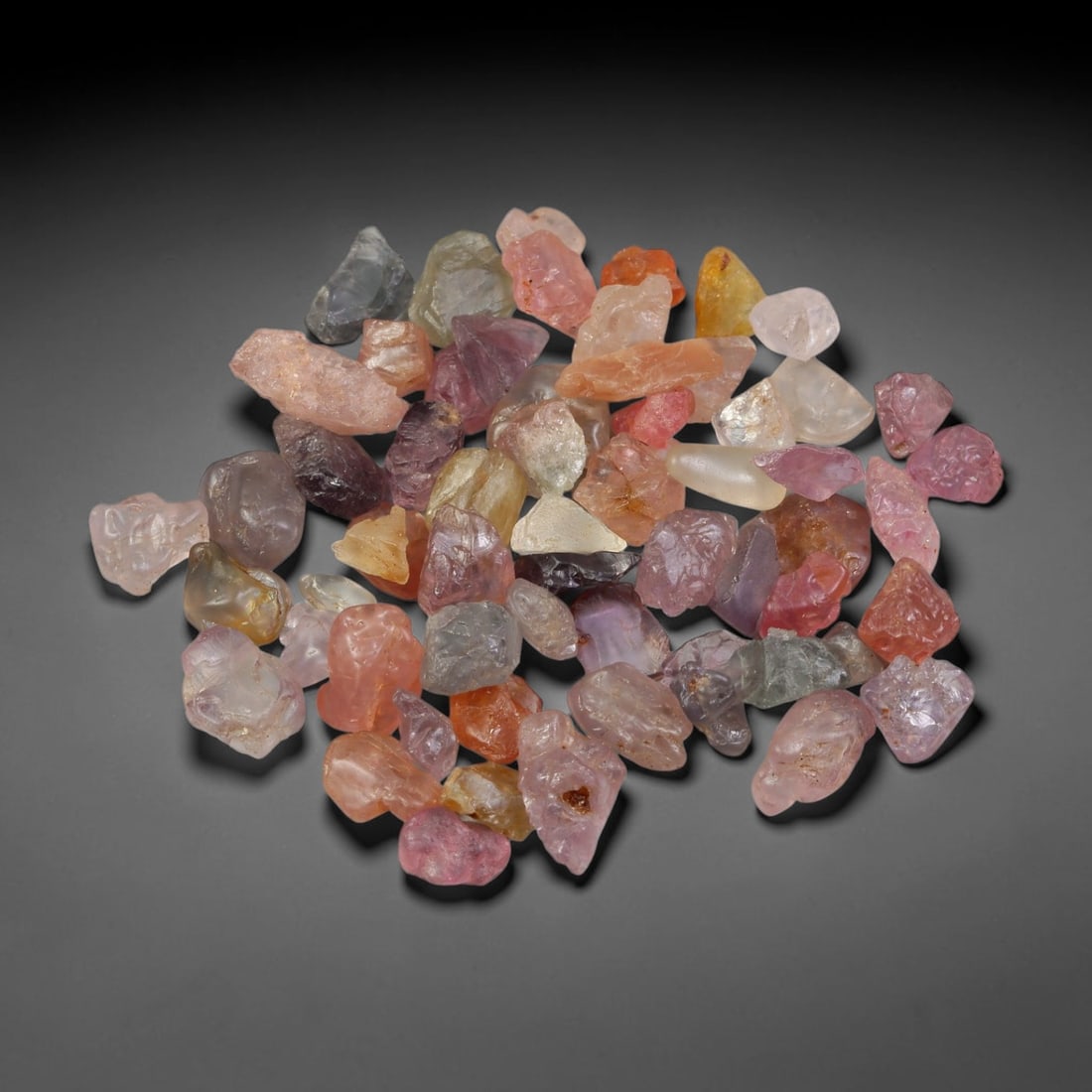 94.66ct Natural Multi-Colour Spinel Rough Parcel Loose Gemstone, 75YS: Natural spinel rough parcel showcasing a beautiful array of soft varied hues with subtle tonal differences throughout each crystal. Raw crystalline surfaces carry authentic natural mineral textures an