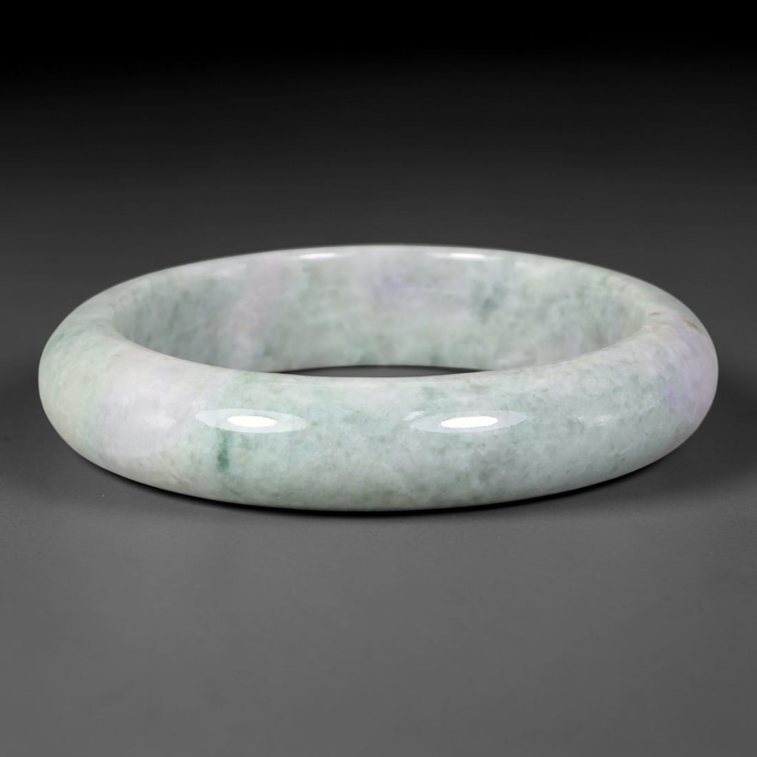 Natural Burmese Type A Pale Misty Green Jadeite Jade Bangle Bracelet, 40TD: Genuine Burmese Type A jadeite jade bangle, smooth polished finish with soft misty pale green tones across a milky base, accented with faint lavender undertones. Inner diameter 62mm, band width 15mm. 