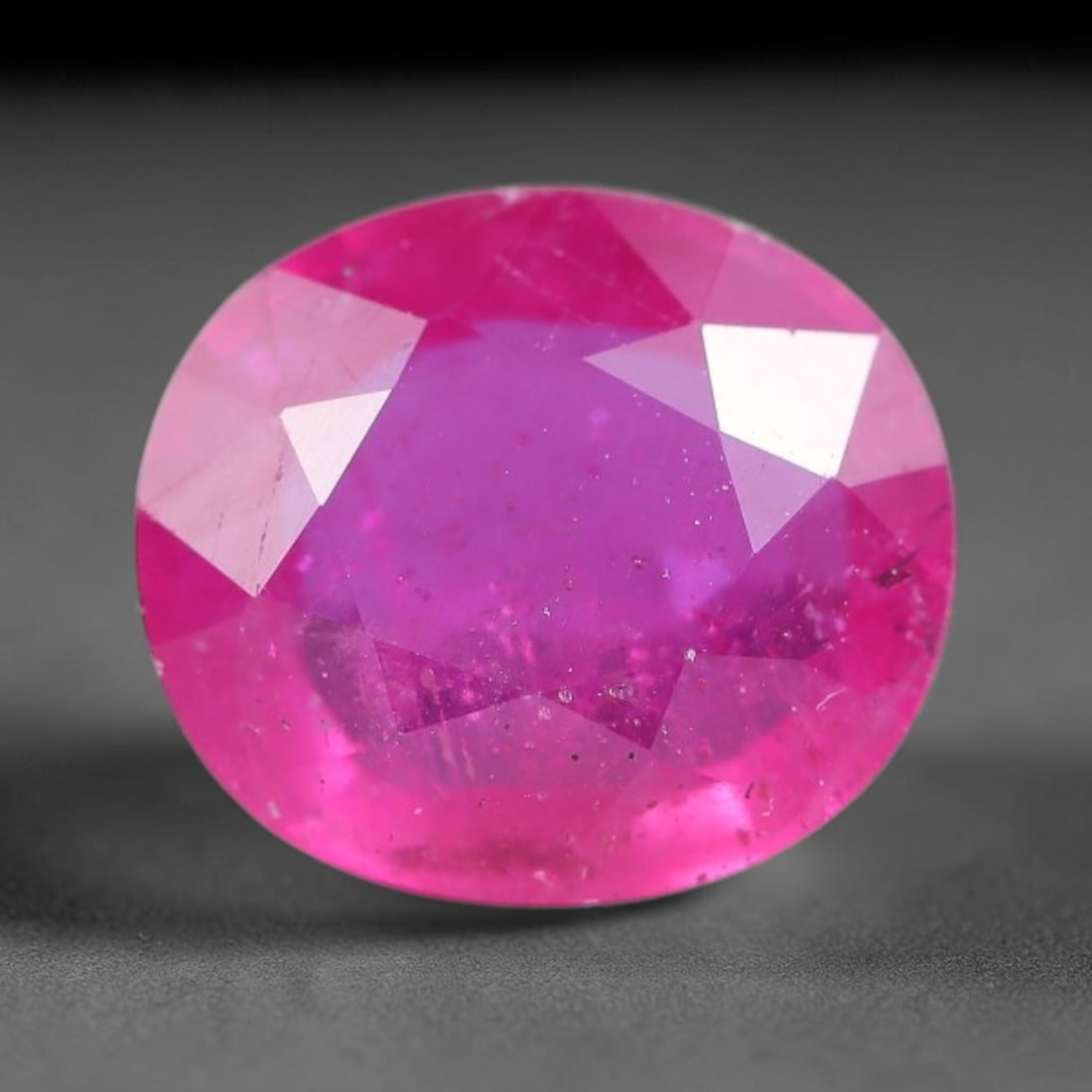 4.00 Carats Natural Mozambique Ruby Oval Faceted Loose Gemstone, 99WY: This natural Mozambique ruby is fashioned with standard oval brilliant faceting, displaying vivid saturated crimson-red hue accompanied by native fine mineral inclusions and subtle trace marks inheren
