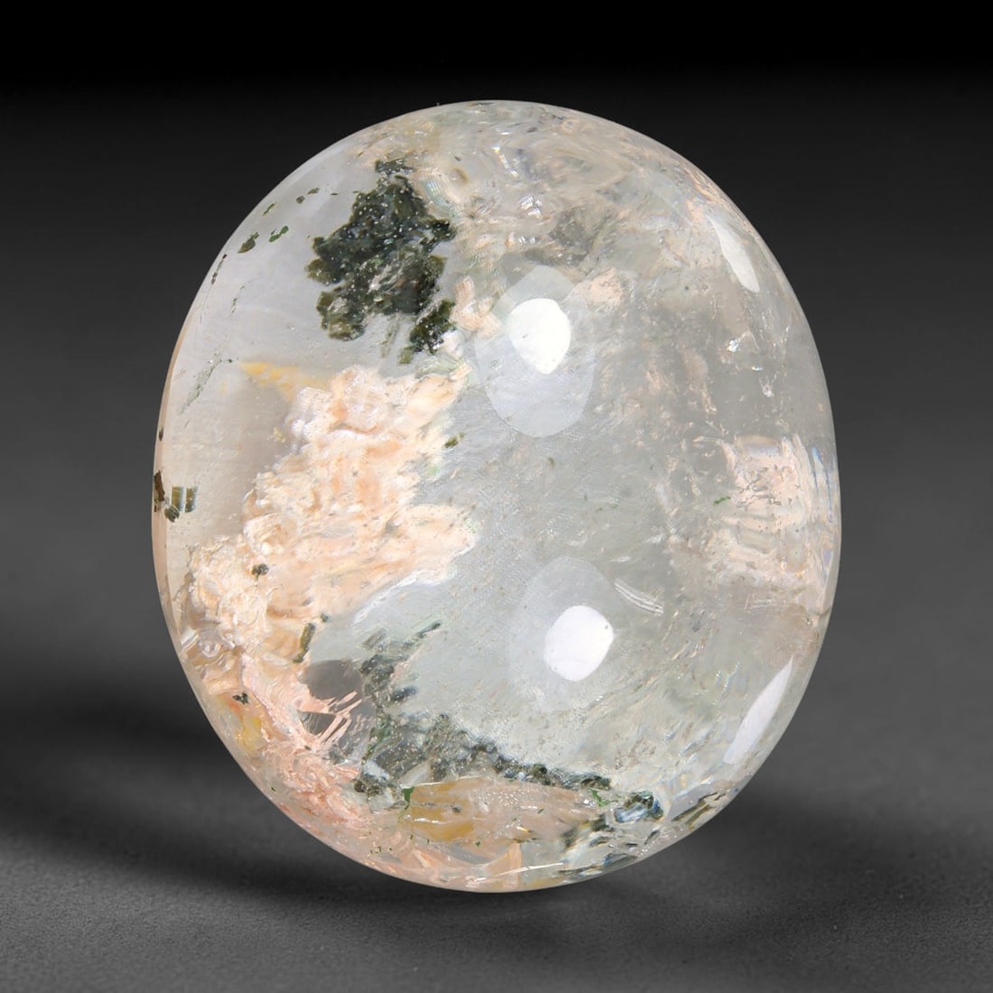28.87ct Natural Brazilian Phantom Quartz Oval Cabochon Loose Gemstone, 25YZ: This smoothly polished cabochon of natural phantom quartz preserves delicate layered phantom crystal formations enclosed inside transparent quartz host. The domed polished surface offers unobstructed 