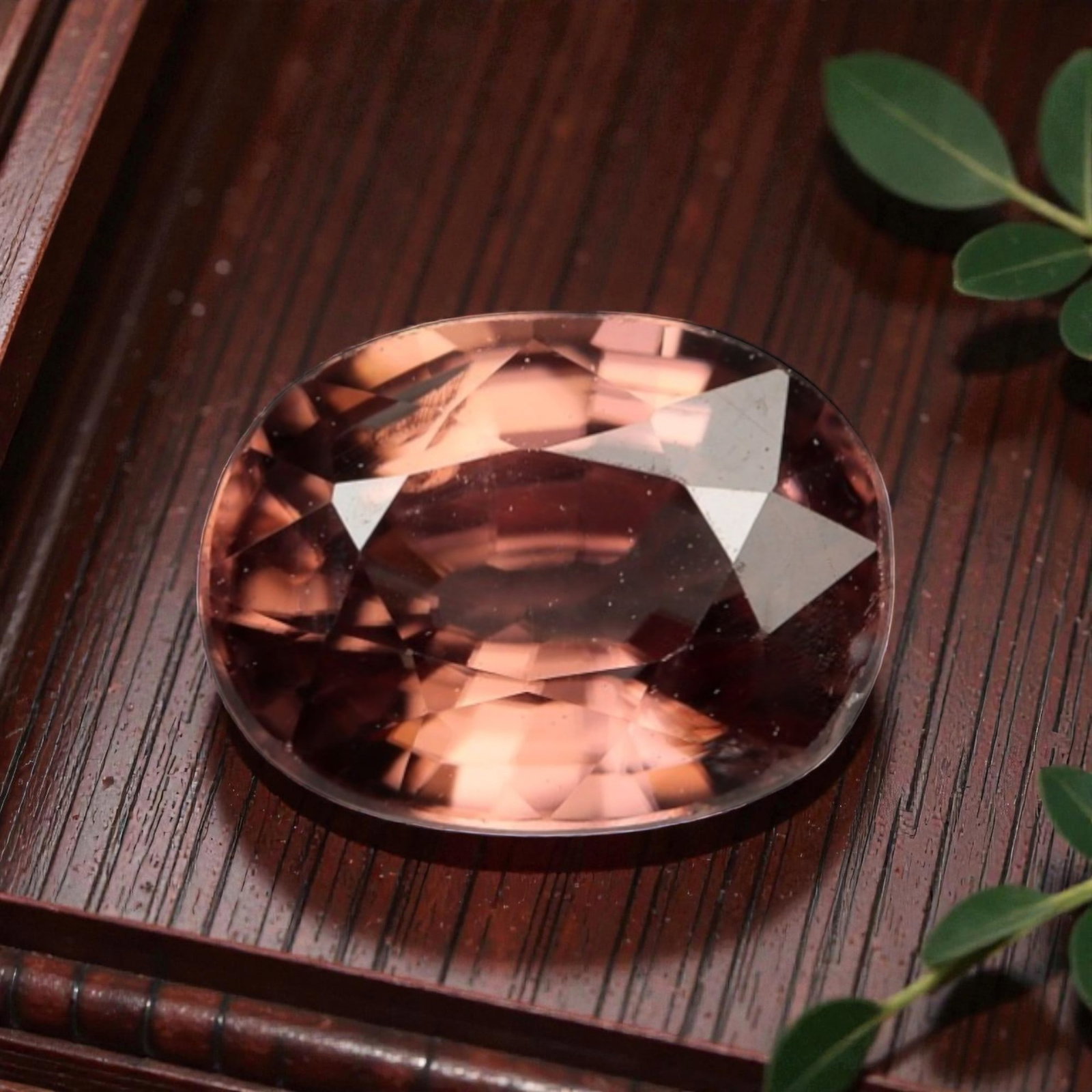 1.142 Carats Certified Orange Purplish Zircon - Natural Gemstone, LZ271: This singular oval mixed-cut zircon captivates with a rich, warm orange base infused with subtle purplish undertones, creating a rare and alluring color profile that shifts beautifully under light. Th