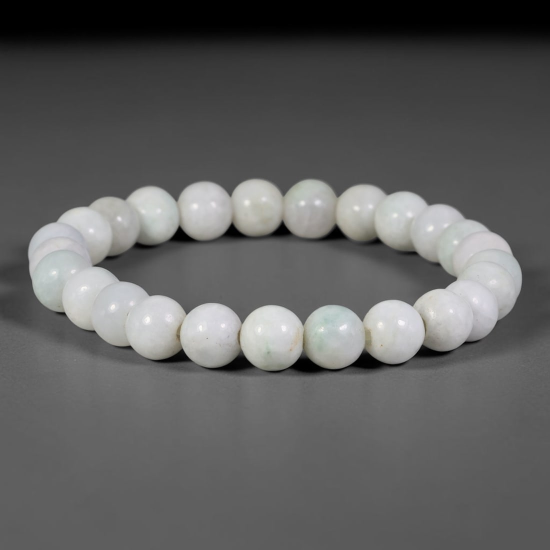 Natural Burmese Type A White Pale Mint Green Jadeite Jade Beaded Bracelet, 48TA: Crafted from untreated natural Burmese Type A jadeite jade beads with maximum bead dimension of 8.85mm, this single loop bracelet features smoothly polished white jadeite beads naturally streaked with