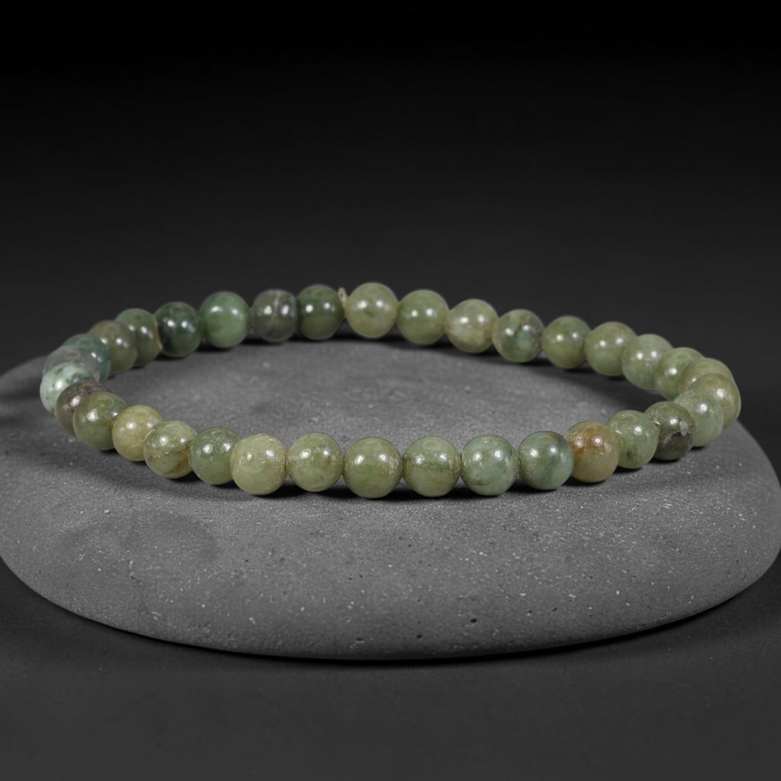 Natural Burmese Type A Muted Olive & Honey Mixed Jadeite Jade Beaded Bracelet, 31TA: Crafted from untreated natural Burmese Type A jadeite jade beads with maximum bead dimension of 6.36mm, this slim single-loop bracelet is strung with smooth polished round beads blending muted olive g