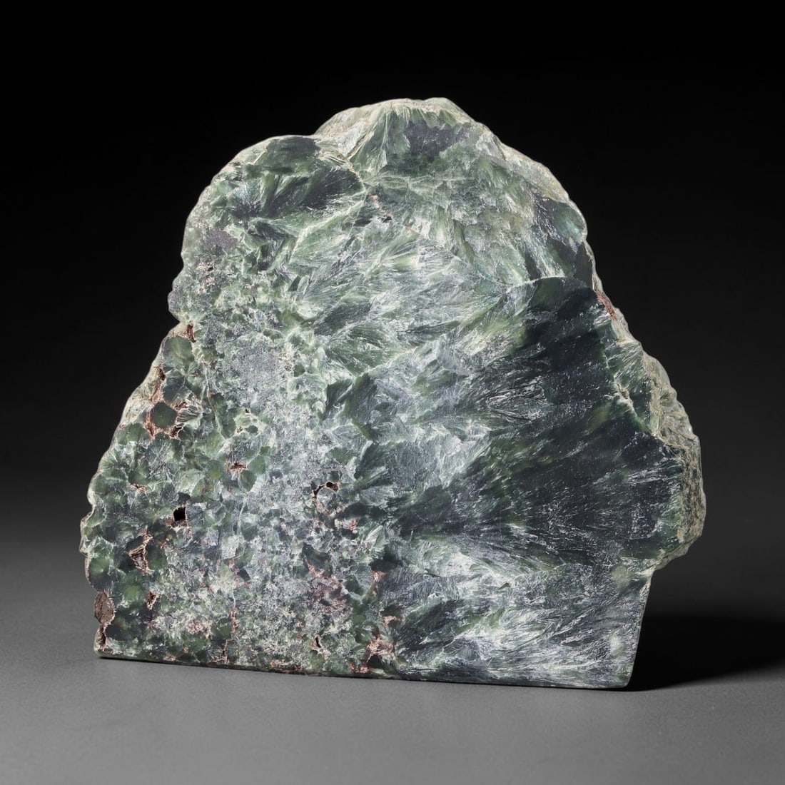 114ct Natural Siberian Seraphinite Polished Rough Slab, 53WV: This polished mineral slab is natural seraphinite originating from Siberian deposits, displaying characteristic radiating crystalline fibrous formations with layered deep forest and silvery green band